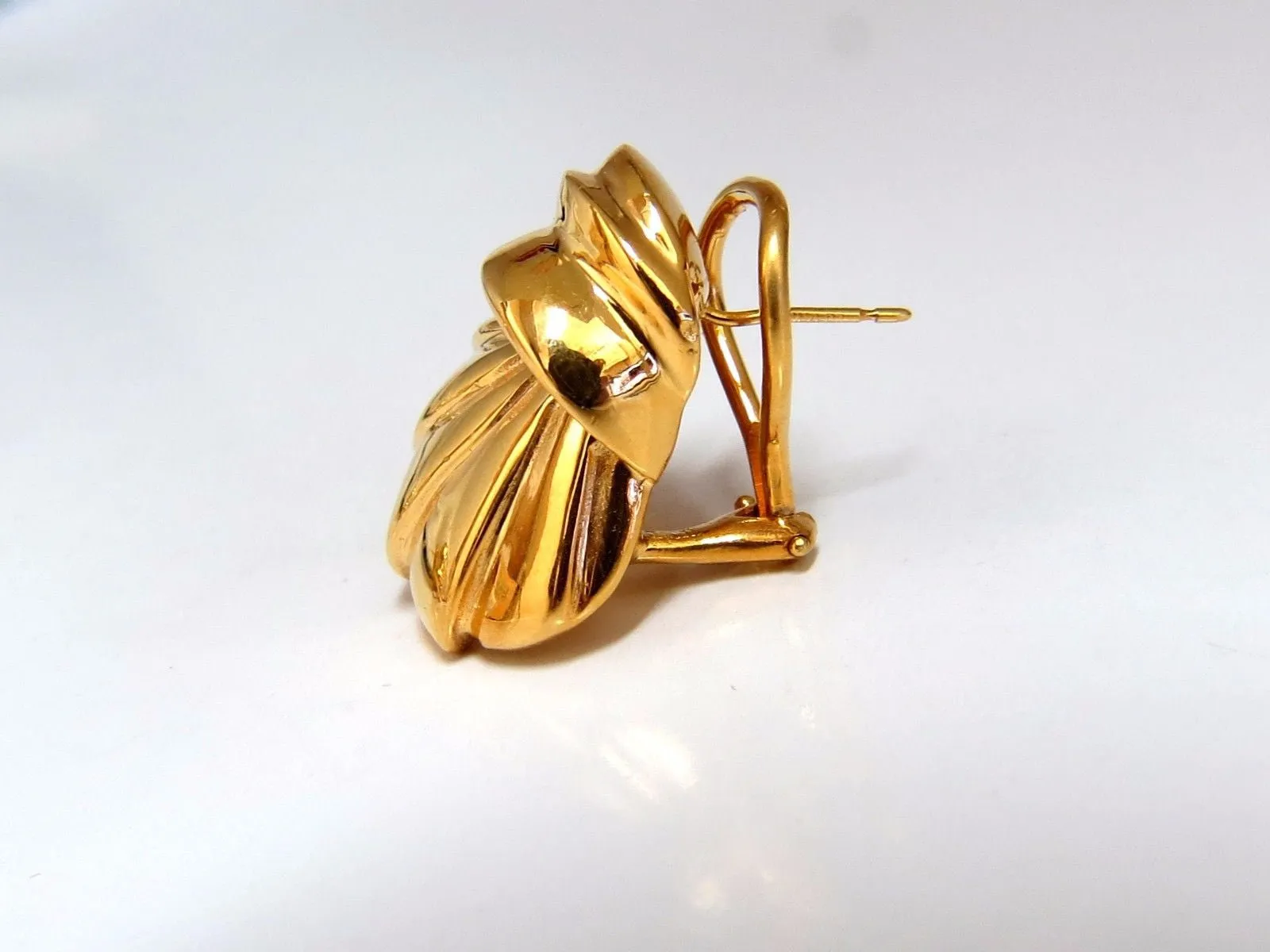 14kt shell form 3d clip on earrings 19 gram