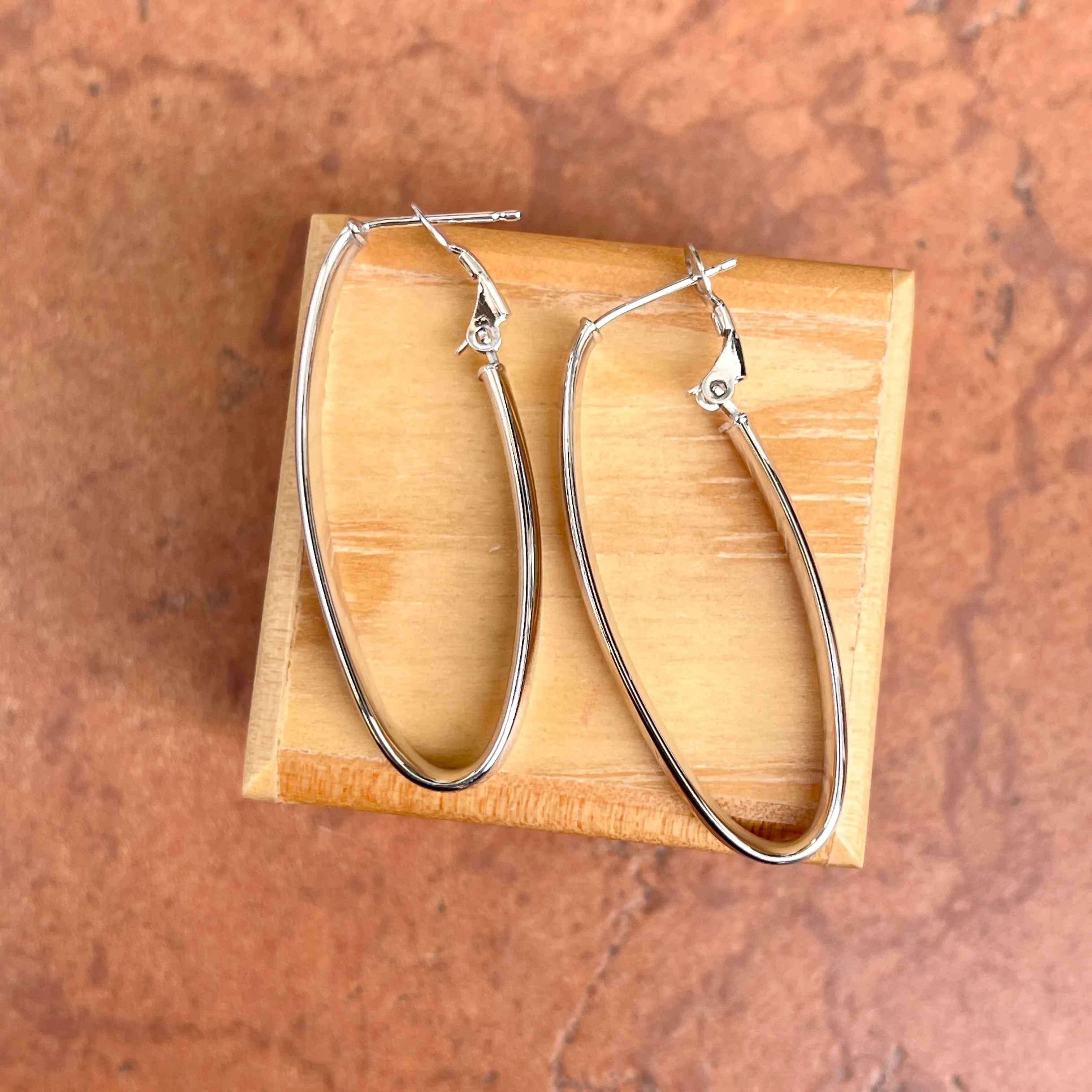 14KT White Gold Oval Omega Back Hoop Earrings 43mm