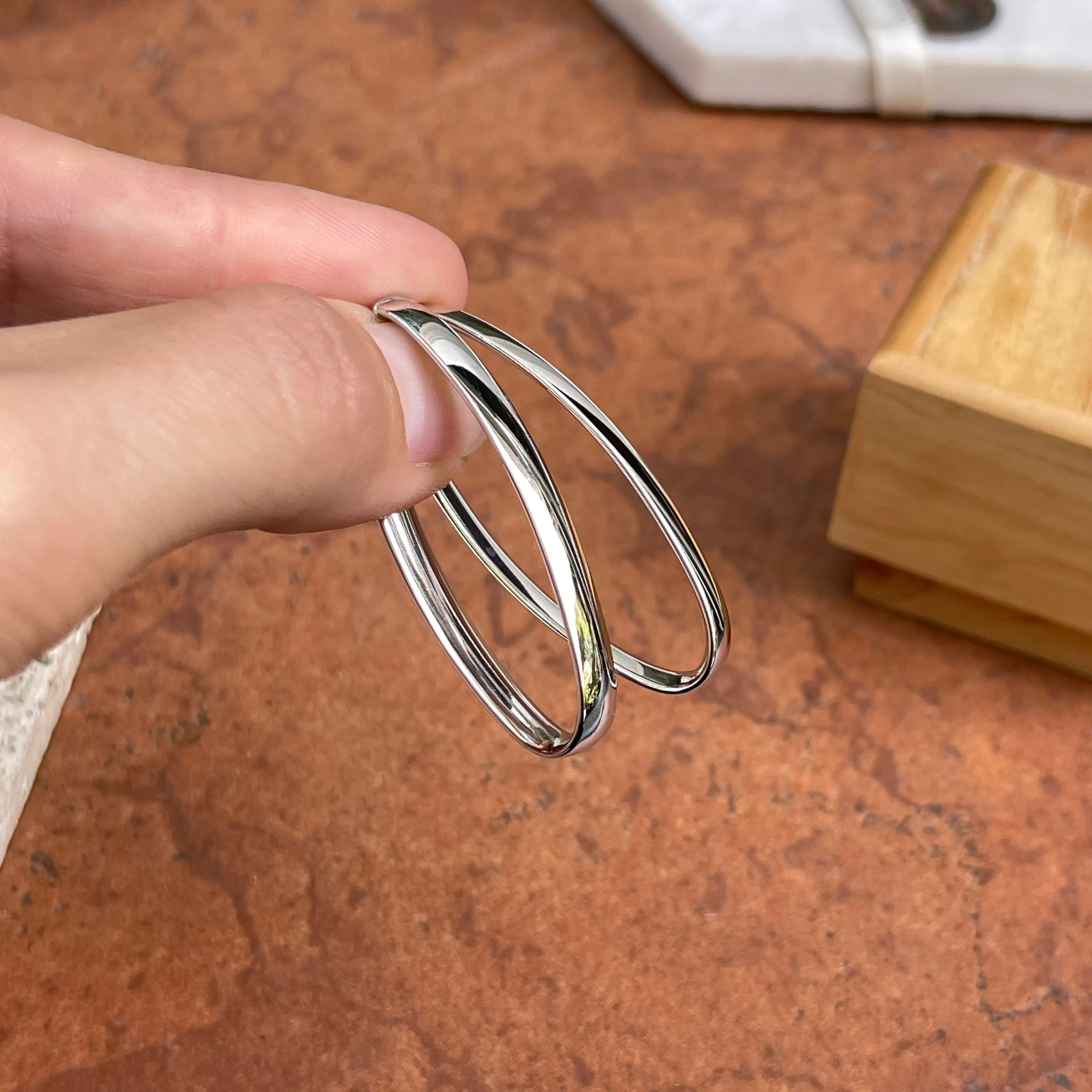 14KT White Gold Oval Omega Back Hoop Earrings 43mm