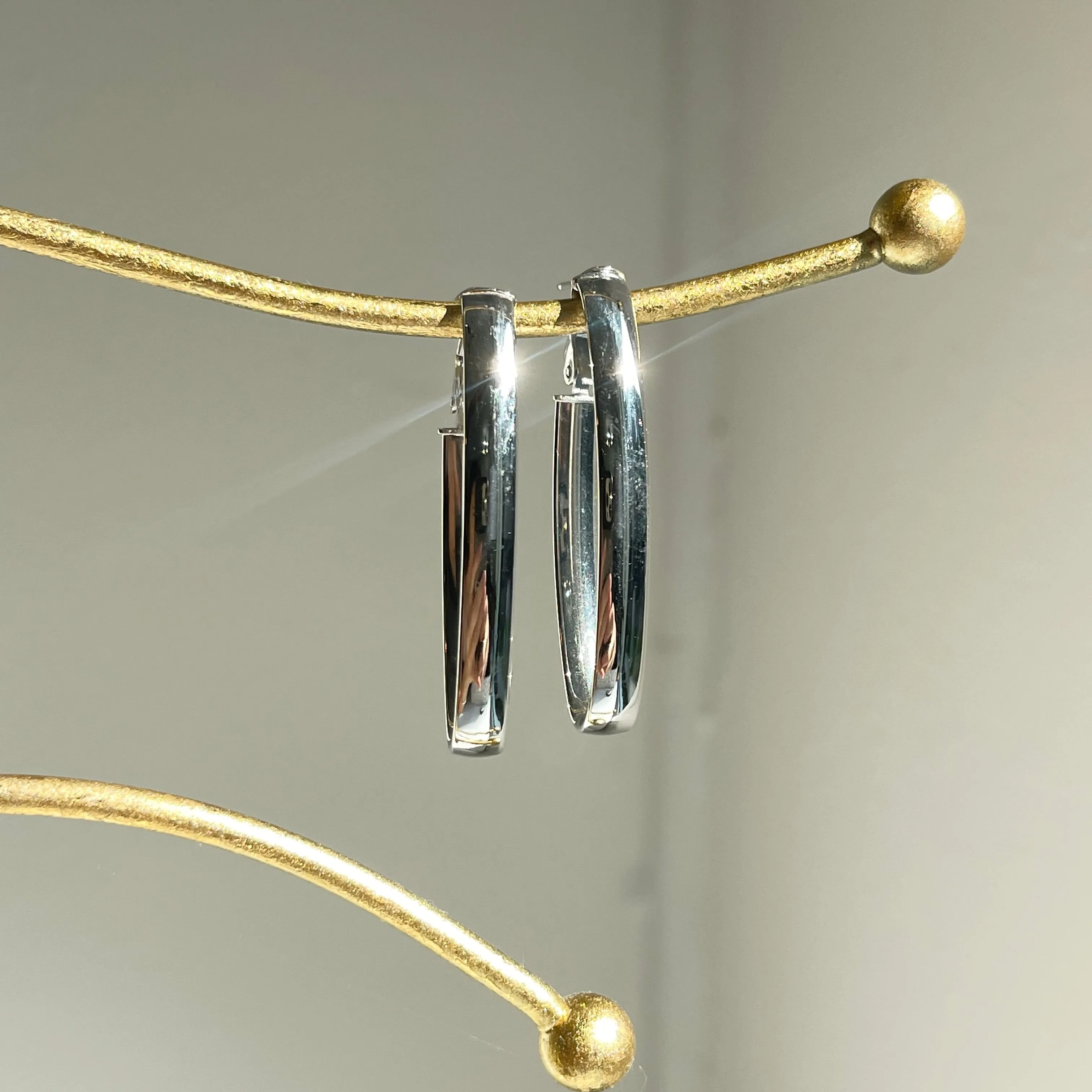 14KT White Gold Oval Omega Back Hoop Earrings 43mm