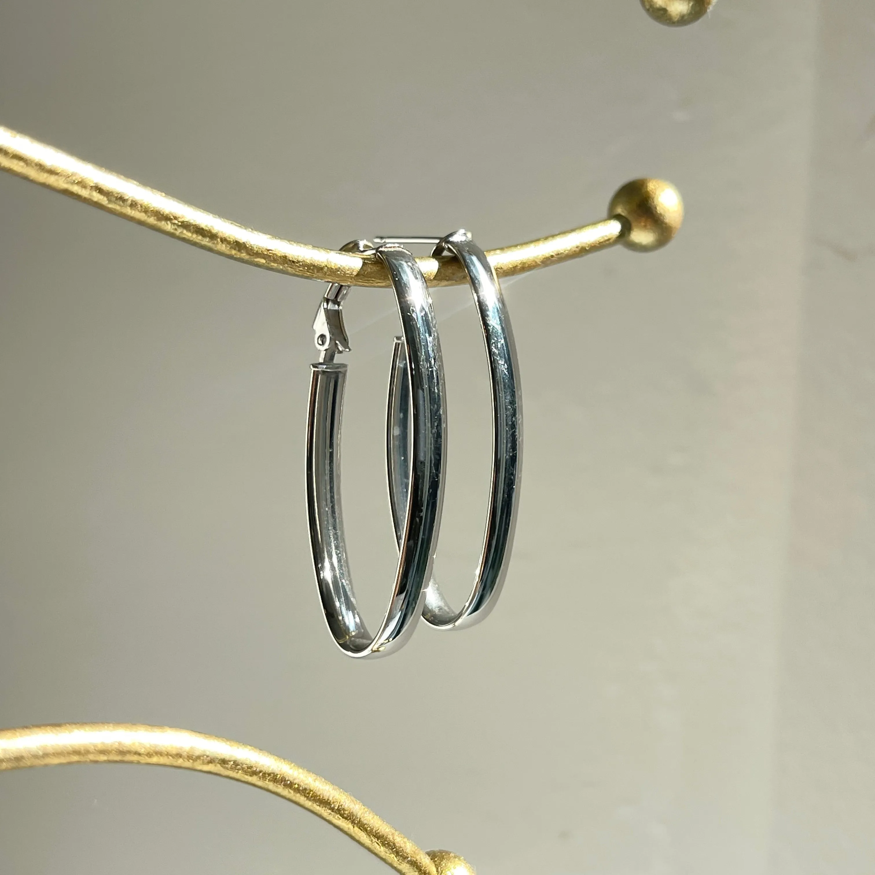 14KT White Gold Oval Omega Back Hoop Earrings 43mm