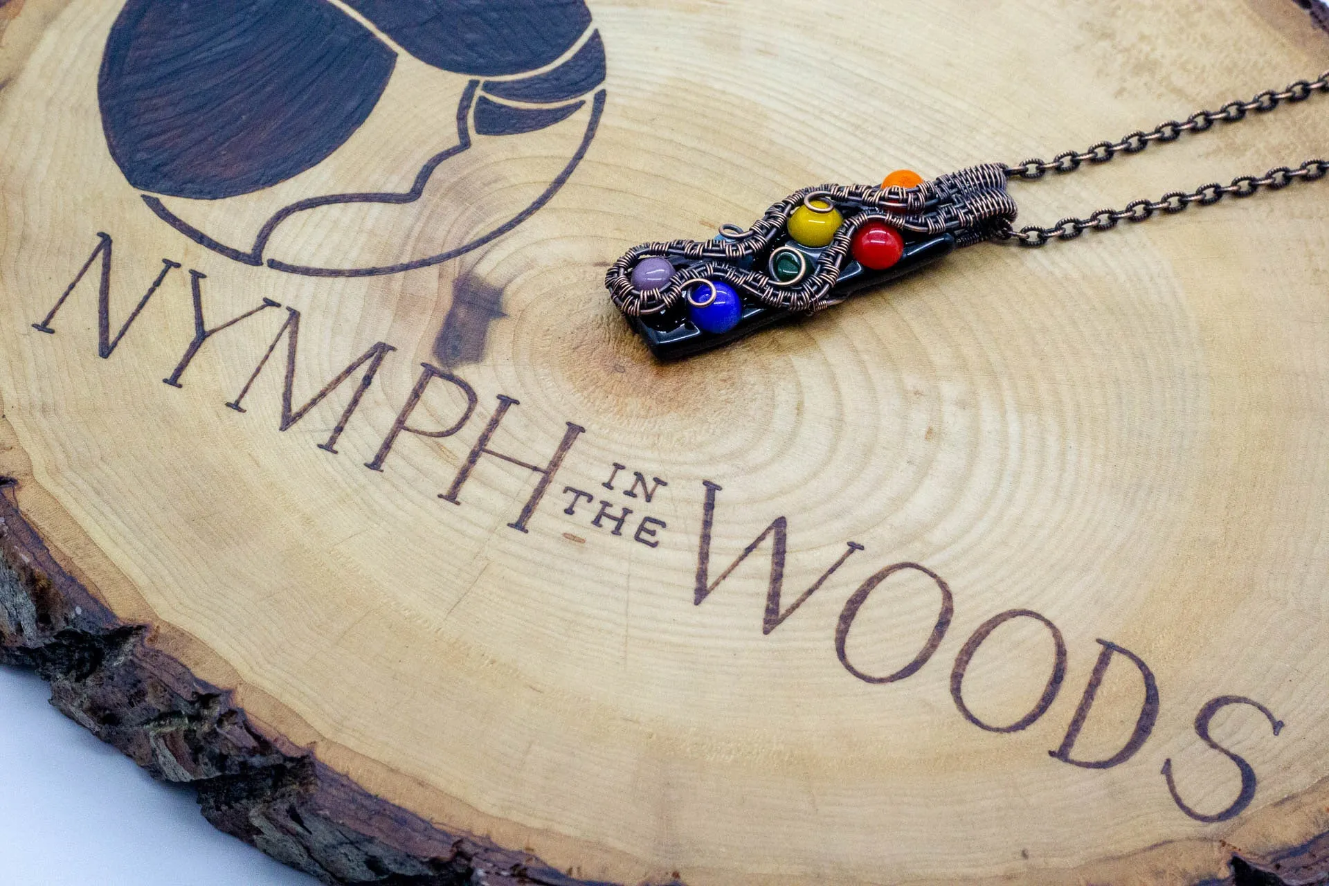 Chakra-inspired Fused Glass Pendant with Copper Wire Wrapping