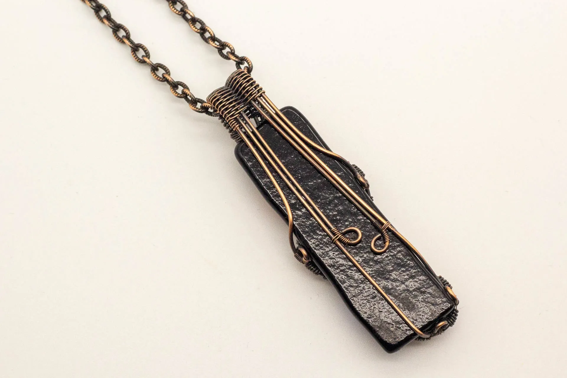 Chakra-inspired Fused Glass Pendant with Copper Wire Wrapping