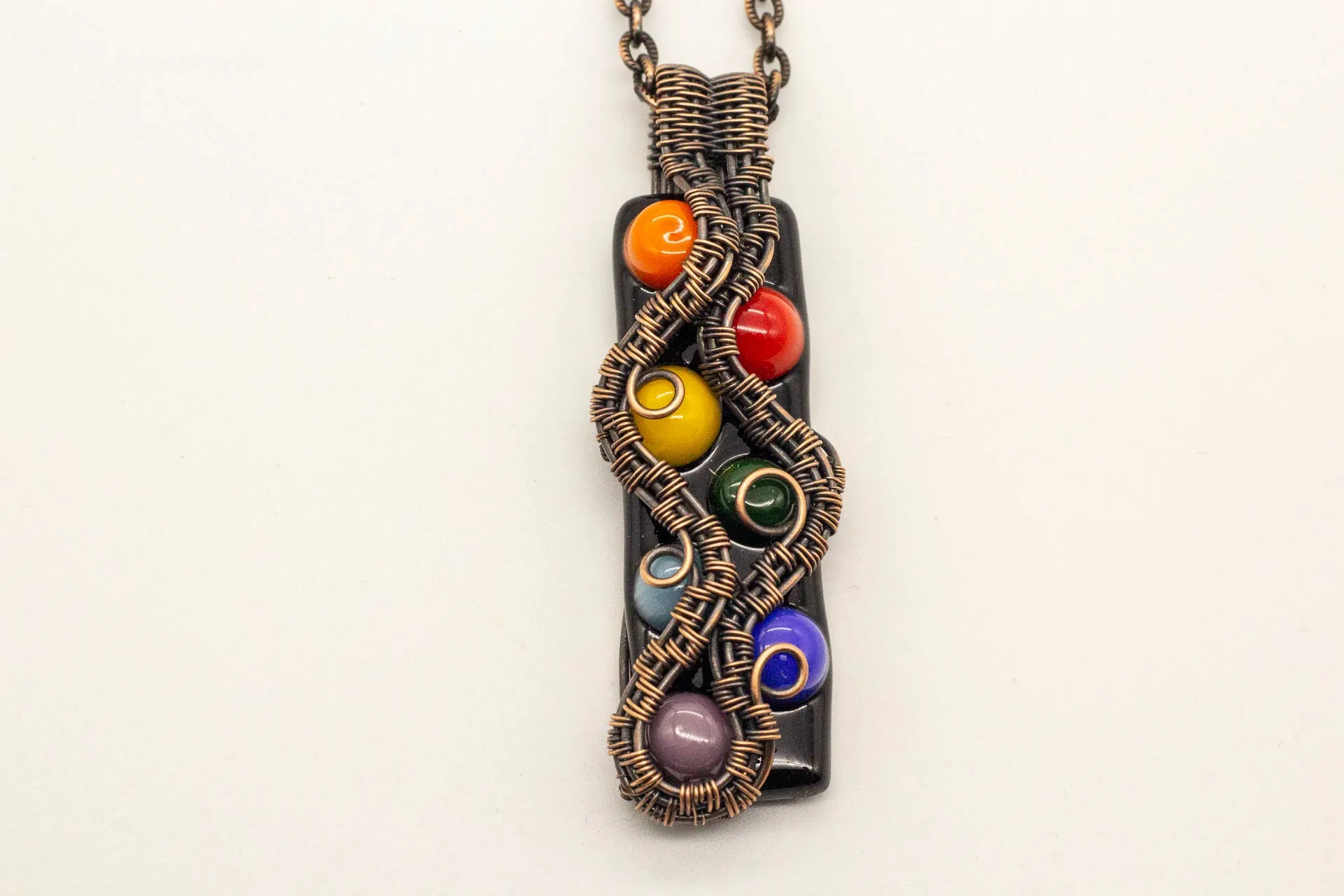 Chakra-inspired Fused Glass Pendant with Copper Wire Wrapping