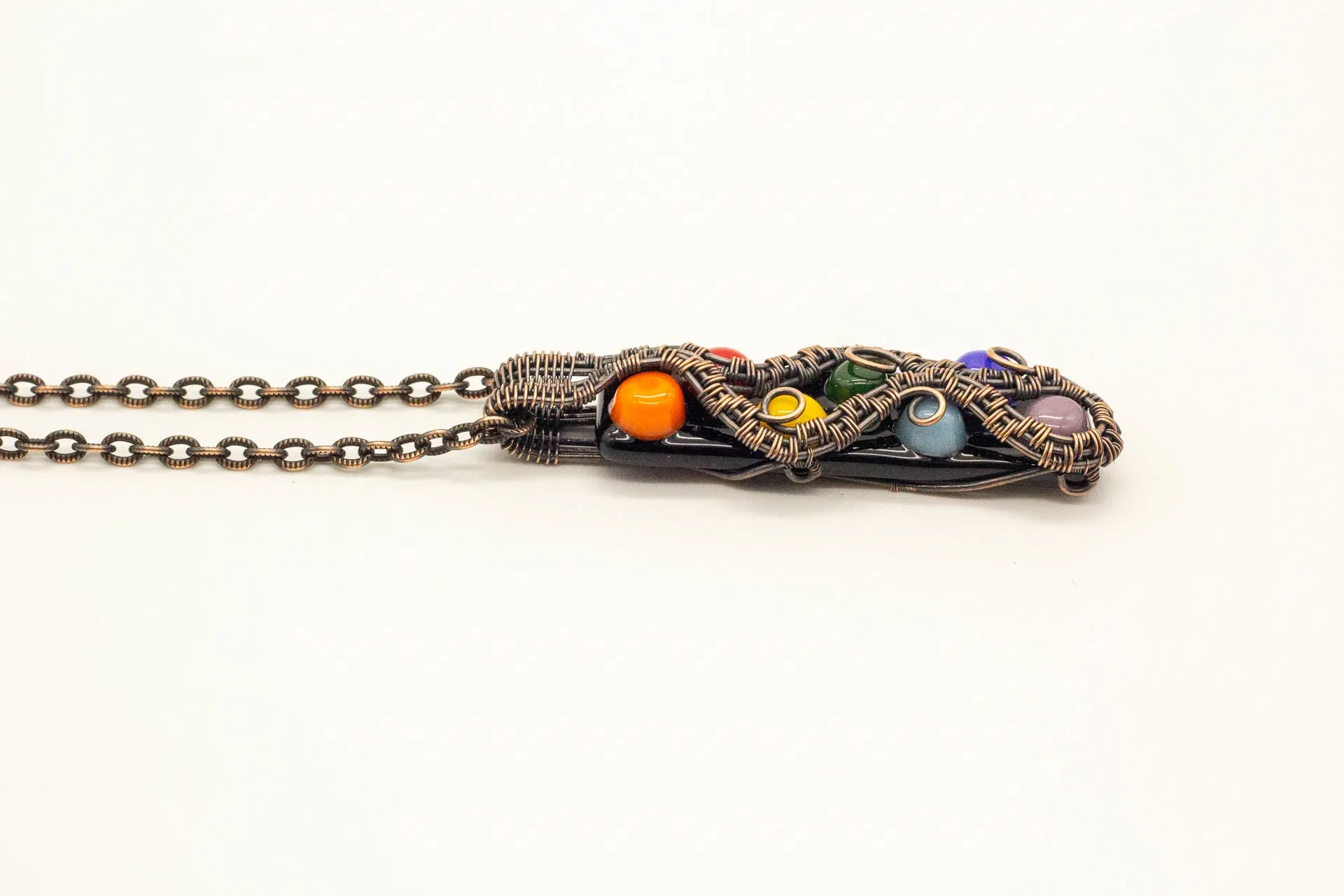 Chakra-inspired Fused Glass Pendant with Copper Wire Wrapping