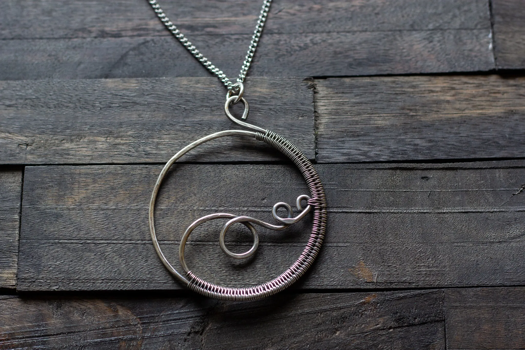 Circular Sterling Silver Wire Wrapped Pendant