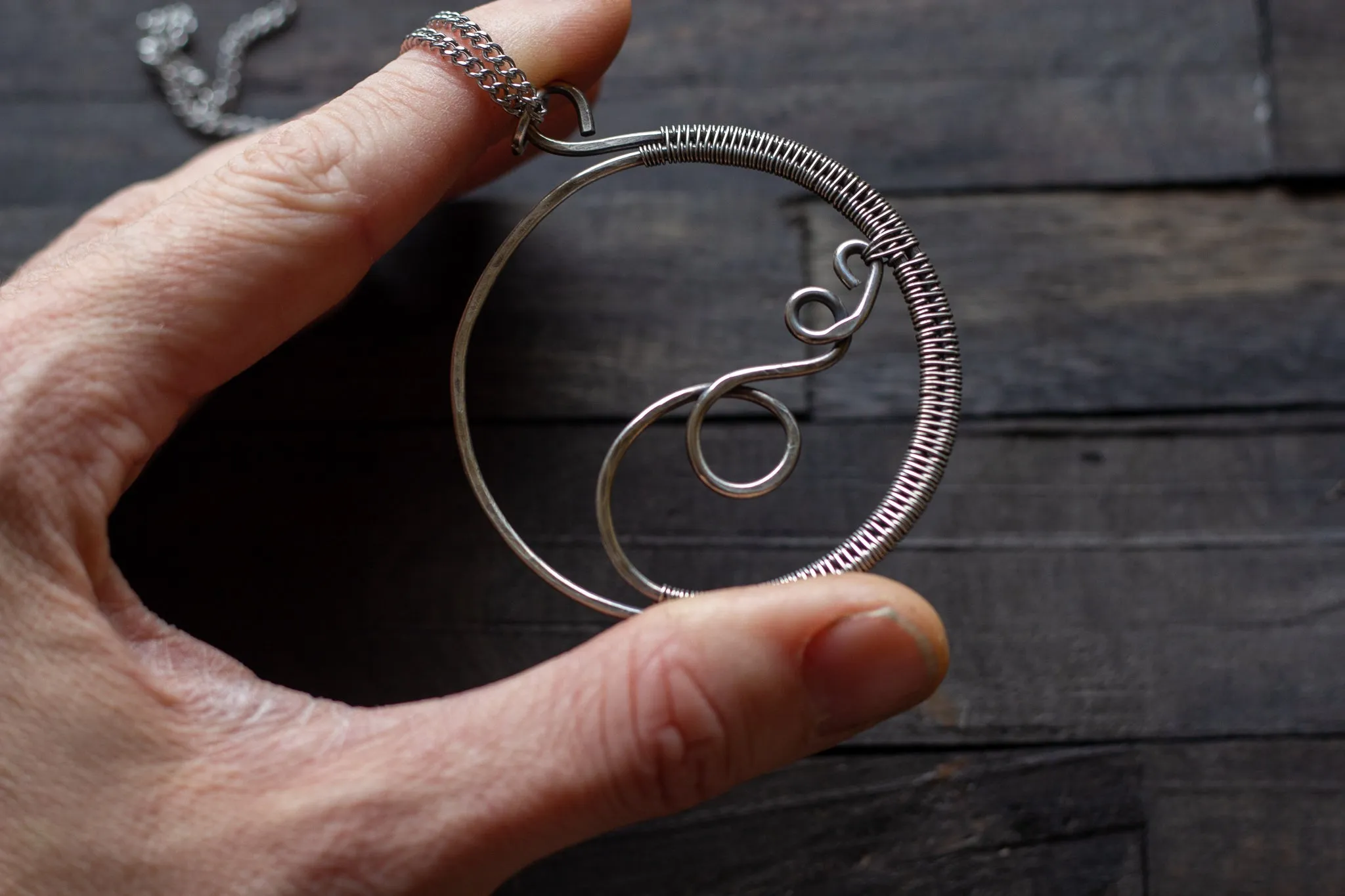 Circular Sterling Silver Wire Wrapped Pendant