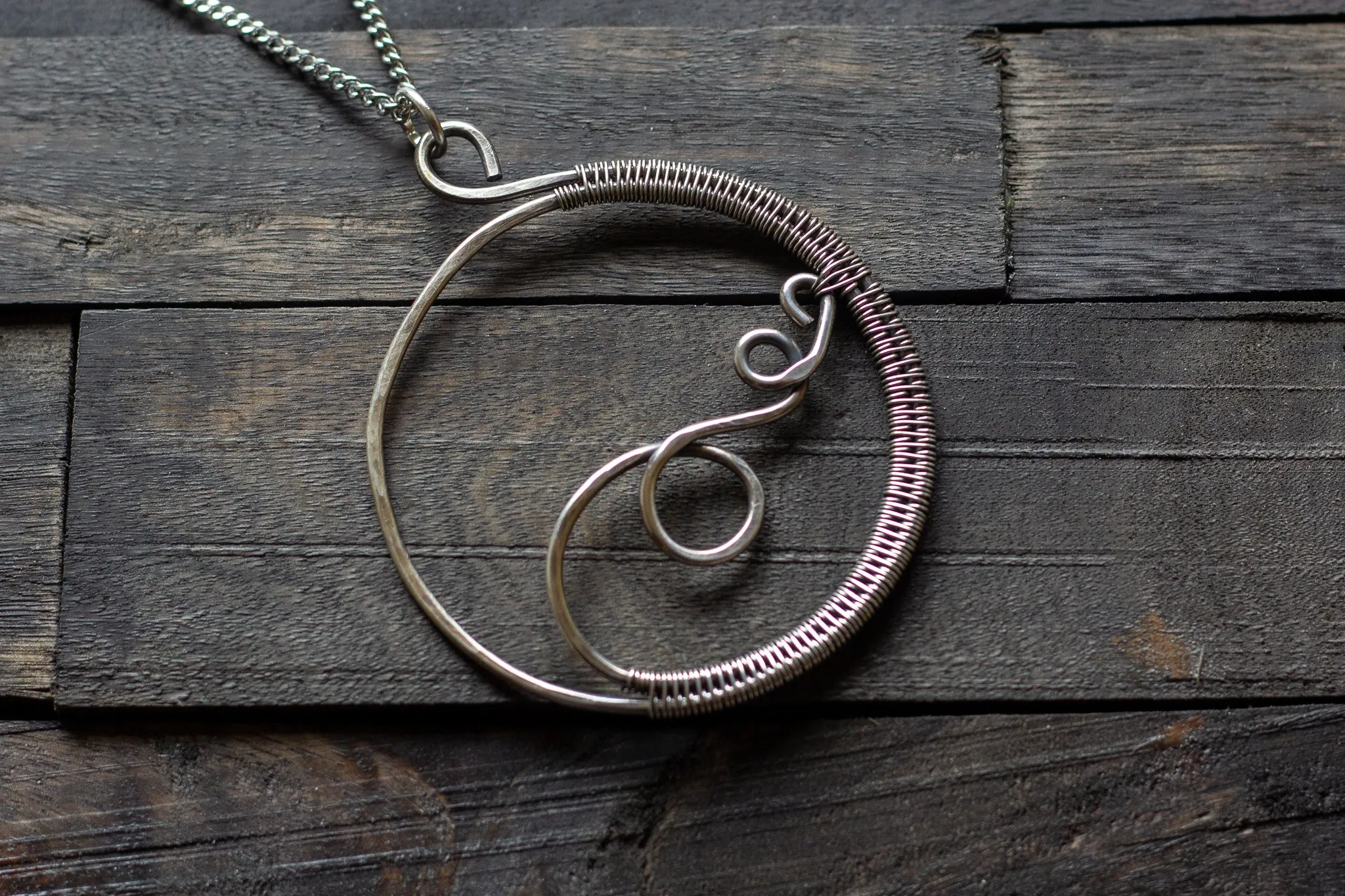 Circular Sterling Silver Wire Wrapped Pendant