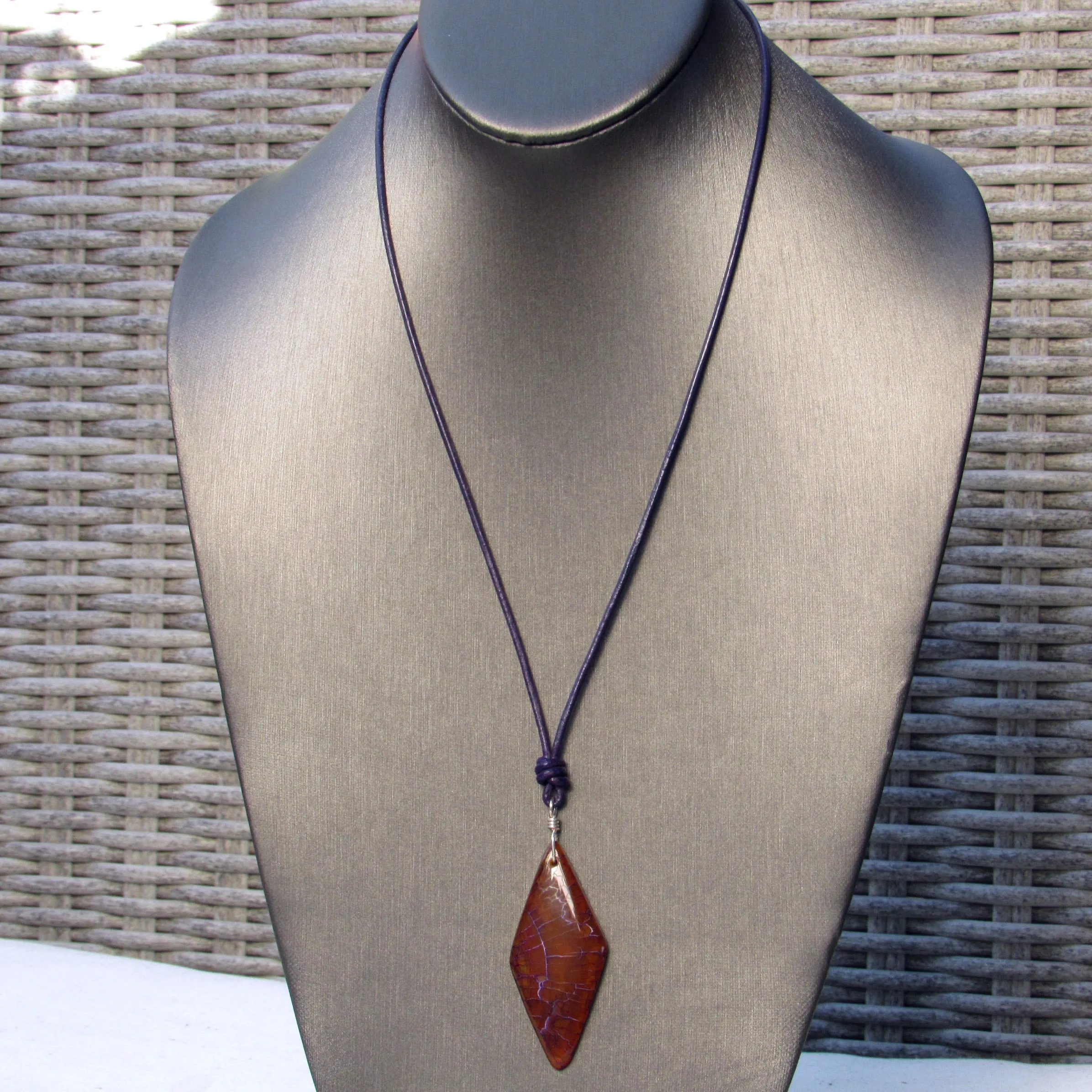 Dragon’s Vein Agate gemstone, Sterling Silver, and Leather