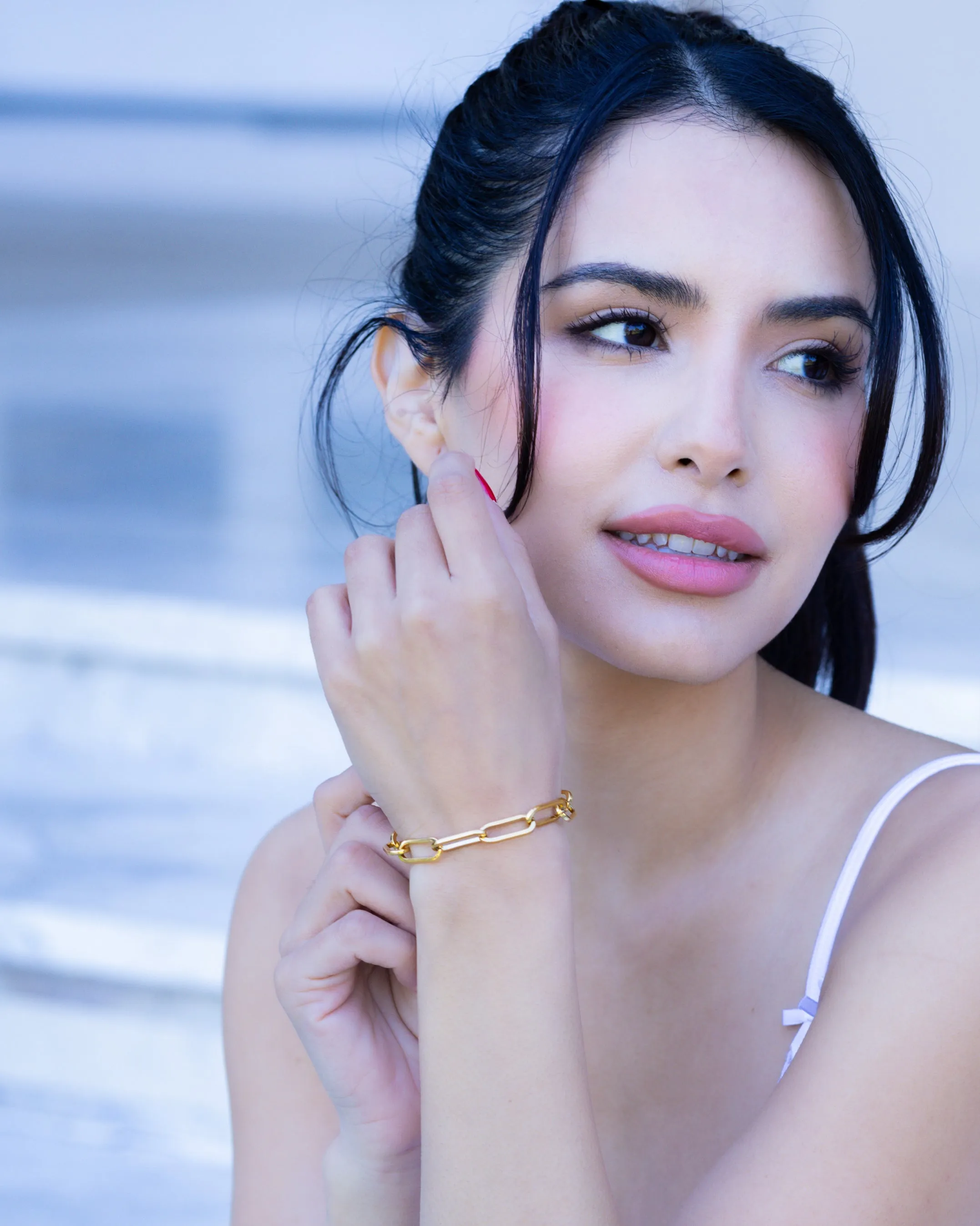 Gold Chunky Paperclip Chain bracelet with toggle closure.