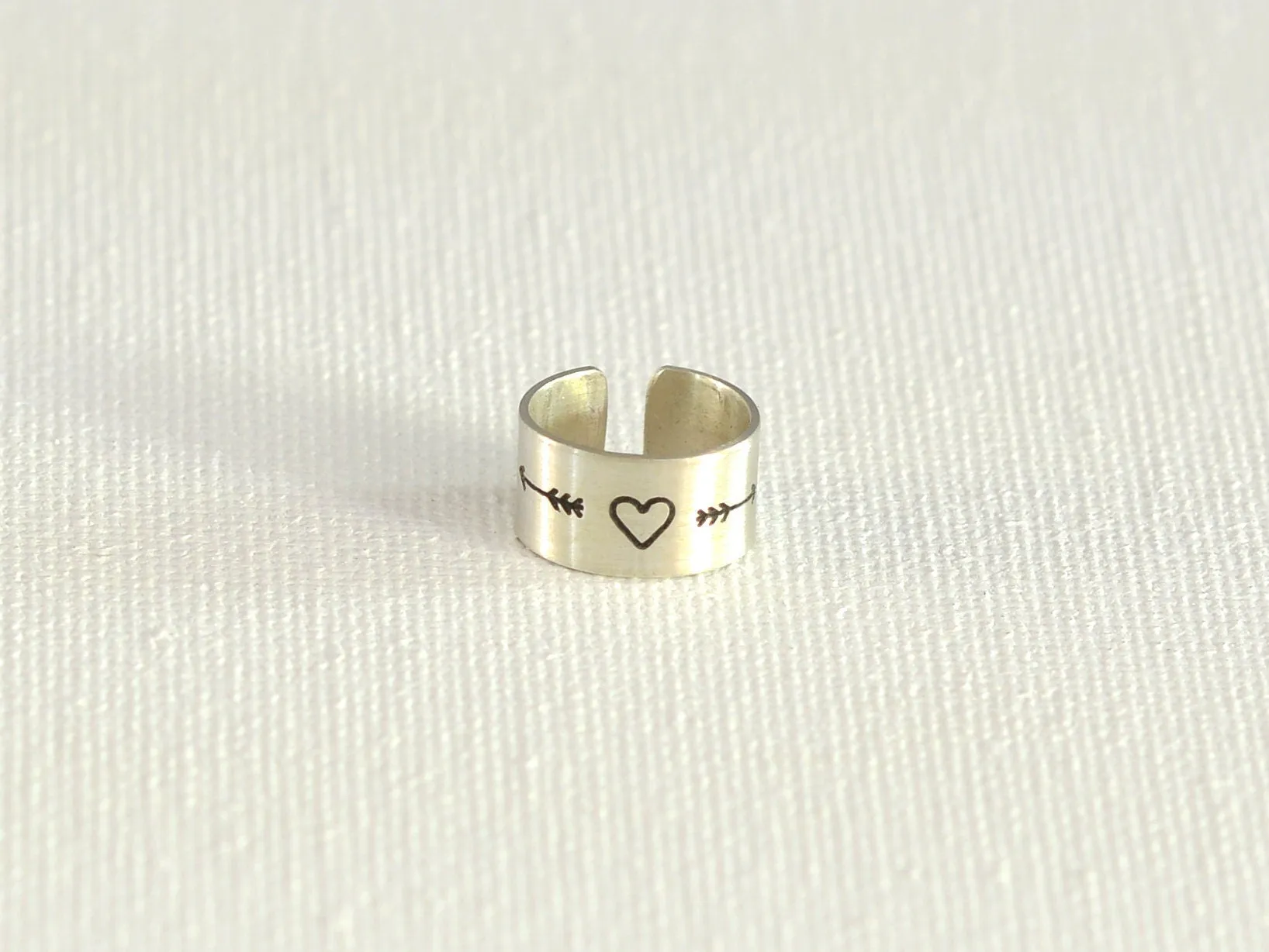 Heart and arrow ear cuff in sterling silver