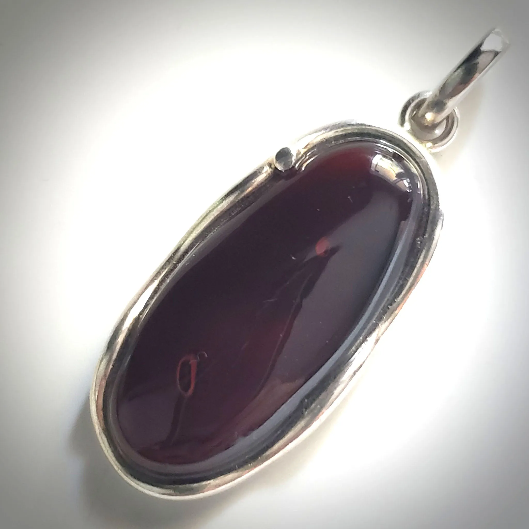 Large Oval Red Cherry Amber Pendant in Modern Sterling Silver
