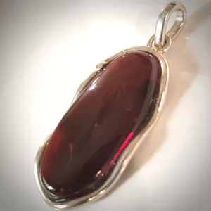 Large Oval Red Cherry Amber Pendant in Modern Sterling Silver
