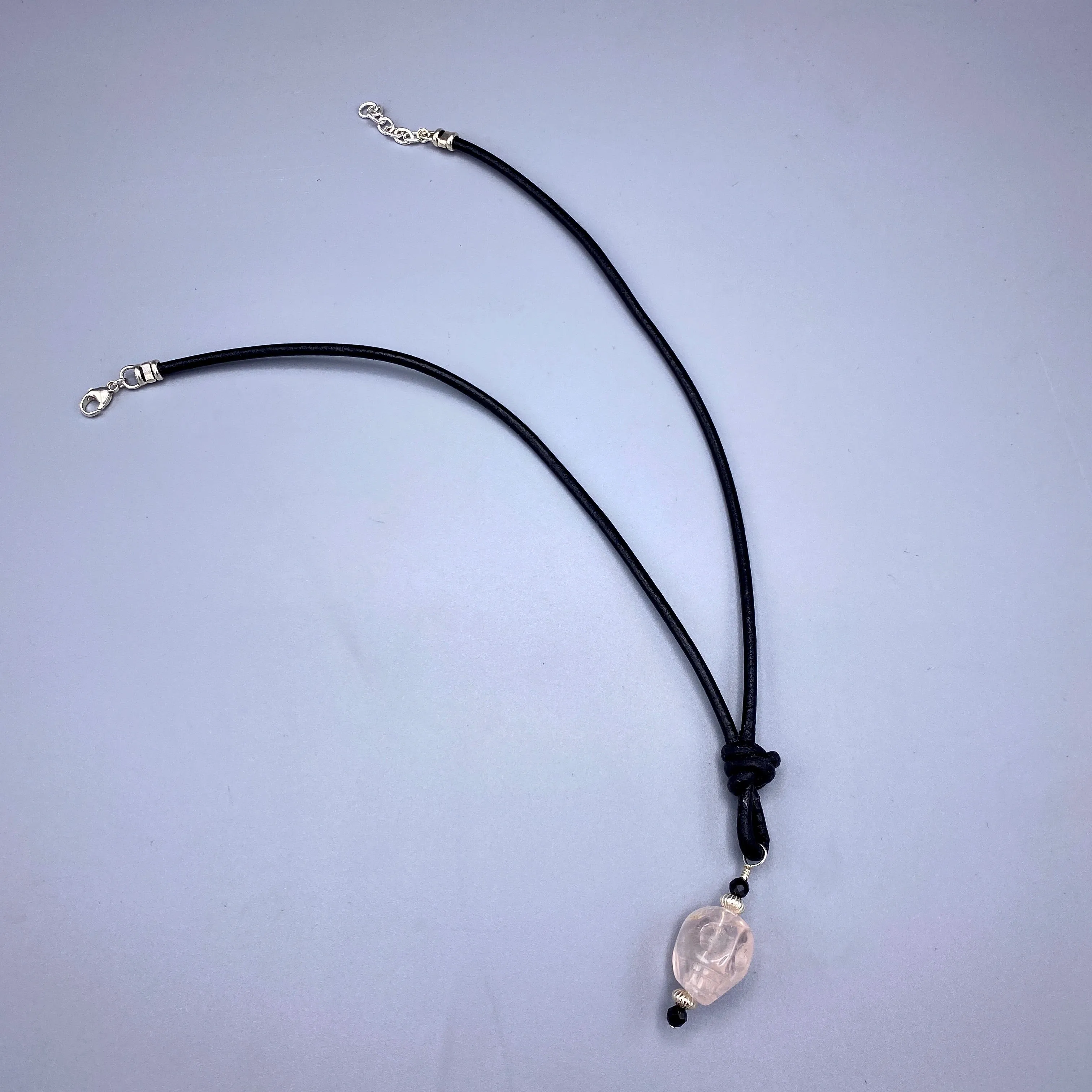 Leather and Gemstone Skull necklaces with Sterling Silver