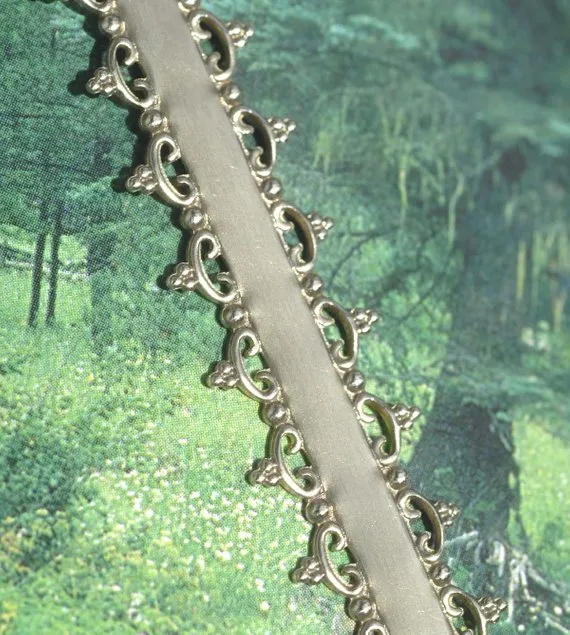Ornate filigree Bezel wire