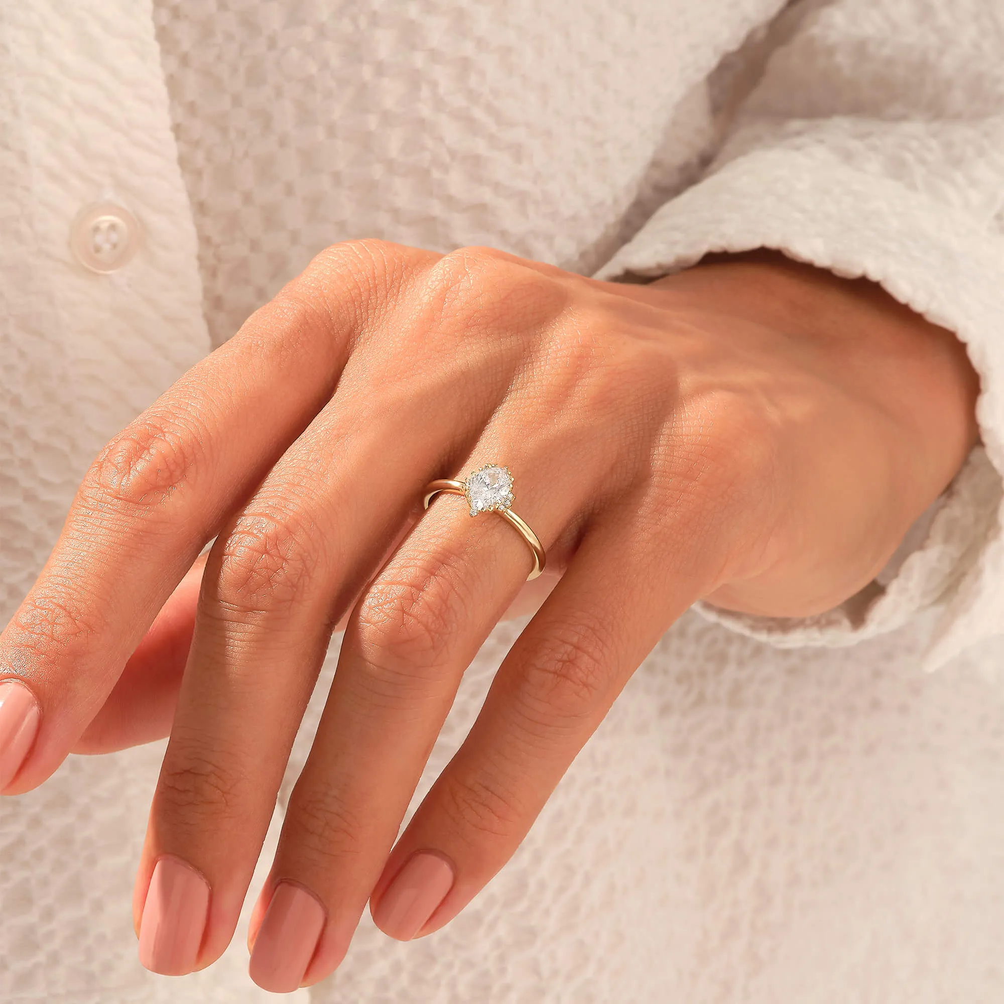 Oval Diamond Vintage Solitaire Engagement Ring in Gold
