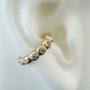 Scalloped white diamonds gold ear cuff