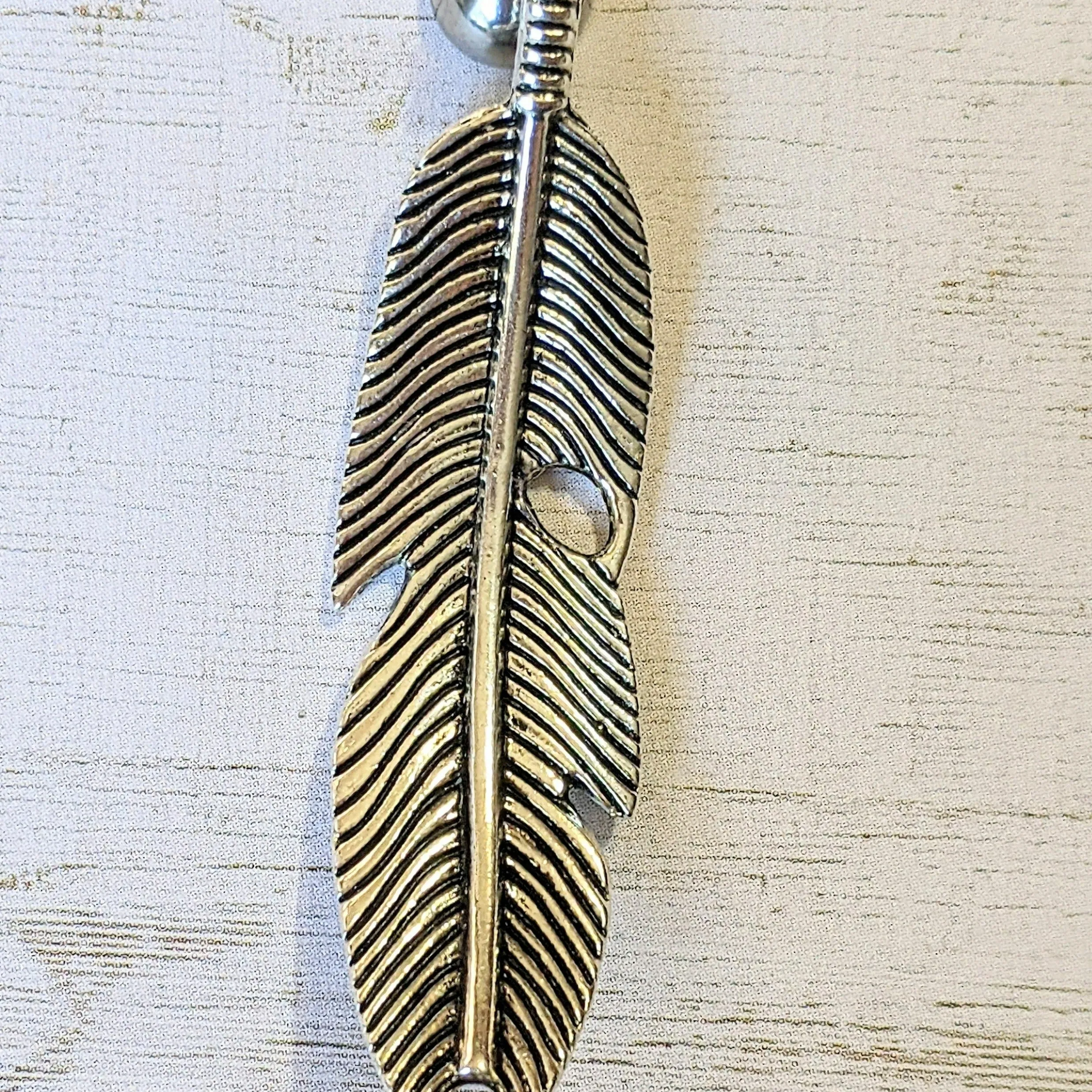 Silver Curved Feather Pendant